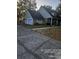 Well-maintained home with brick accents, an attached garage, and a classic architectural style at 6419 Lakeville Rd, Orlando, FL 32818