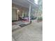 Welcoming front porch features ample seating, decor, and a covered entrance at 6419 Lakeville Rd, Orlando, FL 32818