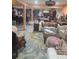 Open-concept living area features diverse seating options and a vibrant, eclectic style at 6419 Lakeville Rd, Orlando, FL 32818