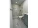 Bathroom featuring marble tile in the shower at 705 Wood Ln, Kissimmee, FL 34759