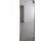 Bedroom features light grey flooring and a ceiling fan at 705 Wood Ln, Kissimmee, FL 34759