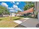Backyard featuring a patio, a shade sail, and a shed at 710 California Ave, St Cloud, FL 34769