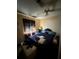 Cozy bedroom featuring a large bed, neutral walls, and ample natural light, creating a serene atmosphere at 716 Grove Ave, Orlando, FL 32805