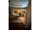 Functional kitchen with a breakfast table, light wood cabinets, and ample counter space for cooking at 716 Grove Ave, Orlando, FL 32805