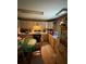 Bright kitchen featuring light wood cabinets, essential appliances, and a cozy dining area, perfect for Gathering meals at 716 Grove Ave, Orlando, FL 32805