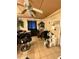 A salon space showcasing salon chairs, a sofa, and shelving units at 716 Grove Ave, Orlando, FL 32805
