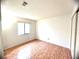 Bright bedroom featuring tile flooring, a large window, and a spacious closet at 849 Long Bay Ct, Kissimmee, FL 34741