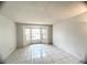 Bright room featuring a bay window and tile flooring at 849 Long Bay Ct, Kissimmee, FL 34741