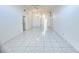 Large, open living area with ceramic tile and plenty of natural light at 849 Long Bay Ct, Kissimmee, FL 34741