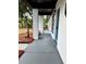 Covered entry showcasing updated brickwork and a welcoming blue door at 906 San Domingo Rd, Orlando, FL 32808