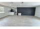 Open floor plan featuring a modern kitchen with stainless appliances and a spacious living room at 906 San Domingo Rd, Orlando, FL 32808