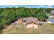 Aerial view of home with a fenced backyard and a storage shed, perfect for outdoor activities and storage at 923 Gascony Ct, Kissimmee, FL 34759