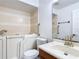 Bathroom with walk-in tub, handrails, vanity, and a mirror at 923 Gascony Ct, Kissimmee, FL 34759