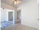 Light-filled room showcasing tiled floors and multiple doorways at 923 Gascony Ct, Kissimmee, FL 34759