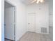 Bright room with tiled flooring featuring white doors and trim at 923 Gascony Ct, Kissimmee, FL 34759