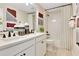 Bright bathroom featuring double sinks and a shower and bath tub at 1058 Cloud Ridge Ct, Mount Dora, FL 32757