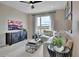 Cozy living room with a comfortable sofa, stylish furnishings, and large windows at 1058 Cloud Ridge Ct, Mount Dora, FL 32757