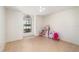 Bright ' room with tiled floors, arched window, and playful decor at 1100 Anne Elisa Cir, St Cloud, FL 34772