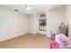 room with tiled floor featuring toys, arched window, and natural light at 1100 Anne Elisa Cir, St Cloud, FL 34772