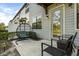 Cozy patio area with a hanging chair and seating, perfect for enjoying the outdoors at 11120 Whistling Pine Way, Orlando, FL 32832