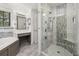 Luxury bathroom boasts a glass shower enclosure, soaking tub, and custom vanity area at 1116 Oak Pond Dr, Celebration, FL 34747