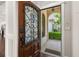 Elegant entryway features a decorative front door and a welcoming view into the home at 1116 Oak Pond Dr, Celebration, FL 34747