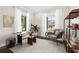Bright home office features hardwood floors, neutral colors, and ample natural light at 1116 Oak Pond Dr, Celebration, FL 34747