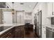 Beautiful kitchen showcasing granite countertops, stainless steel appliances, and custom cabinetry at 1116 Oak Pond Dr, Celebration, FL 34747