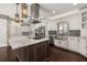 Well-appointed kitchen featuring custom cabinets, stainless steel appliances, and a spacious center island at 1116 Oak Pond Dr, Celebration, FL 34747