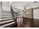 Open living area with hardwood floors, access to the outdoors and decorative stone wall at 1116 Oak Pond Dr, Celebration, FL 34747