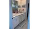 Bright bathroom exhibits a vanity with dual sinks, a large mirror, and modern fixtures, showcasing a blend of functionality at 11688 Founders St, Orlando, FL 32832