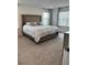 Comfortable bedroom featuring a large bed and soft carpet at 11688 Founders St, Orlando, FL 32832
