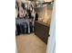 Walk-in closet with ample shelving and hanging space at 11688 Founders St, Orlando, FL 32832