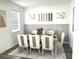 A beautifully staged dining room with seating for six and stylish decor at 11688 Founders St, Orlando, FL 32832