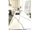 Bright, open kitchen featuring an island, stainless steel appliances, and quartz countertops at 11688 Founders St, Orlando, FL 32832
