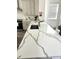 A stunning kitchen features a large center island with stone countertops at 11688 Founders St, Orlando, FL 32832