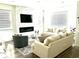 Cozy living room with modern fireplace and comfortable seating at 11688 Founders St, Orlando, FL 32832