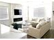 Cozy living room with modern fireplace and comfortable seating at 11688 Founders St, Orlando, FL 32832