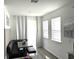 Bright breakfast nook with a table, bench, and large sliding doors to the outside at 11688 Founders St, Orlando, FL 32832