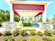Outdoor pavilion has tables and benches, perfect for gatherings and picnics with colorful shade awning at 11688 Founders St, Orlando, FL 32832