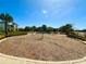 Community playground with wood mulch surface and climbing structure provides a fun recreational space at 11688 Founders St, Orlando, FL 32832
