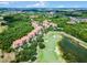 Panoramic aerial view of community featuring lush landscaping, golf course, and scenic views at 1375 Tuscana Ln # 1207, Davenport, FL 33896