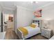 Tastefully decorated bedroom features a view of the well-appointed kitchen at 1375 Tuscana Ln # 1207, Davenport, FL 33896