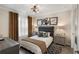 Inviting bedroom with stylish decor, modern furniture, and plenty of natural light at 1375 Tuscana Ln # 1207, Davenport, FL 33896
