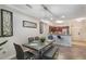 Open-concept dining room with a view of the kitchen and modern decor at 1375 Tuscana Ln # 1207, Davenport, FL 33896