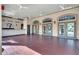 Large open patio with ceiling fans and neutral paint provides cover for parties and events at 1375 Tuscana Ln # 1207, Davenport, FL 33896