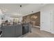 Well-equipped kitchen with modern black appliances and an open-concept dining area at 1385 Peaceful Nature Way, Clermont, FL 34714
