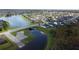 Aerial showing the proximity to water and other residential properties within the community at 1532 Angler Ave, Kissimmee, FL 34746