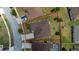 Aerial shot shows the property and lot lines in a residential neighborhood at 1532 Angler Ave, Kissimmee, FL 34746