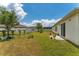Expansive backyard featuring lush green grass and a privacy fence at 1532 Angler Ave, Kissimmee, FL 34746